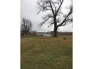 6 Acres with mobile home, 54' x 88' heated and insulated pole building with office, equipment storage, shop, overhead storage and restroom.  Well and 2 septic systems.  24' x 40' livestock or storage building.

Great for mini-farm or additional storage and shop for local farmers.  Excellent potential building site. - 6 Acres with Mobile Home, Pole Building & Storage or Livestock Building